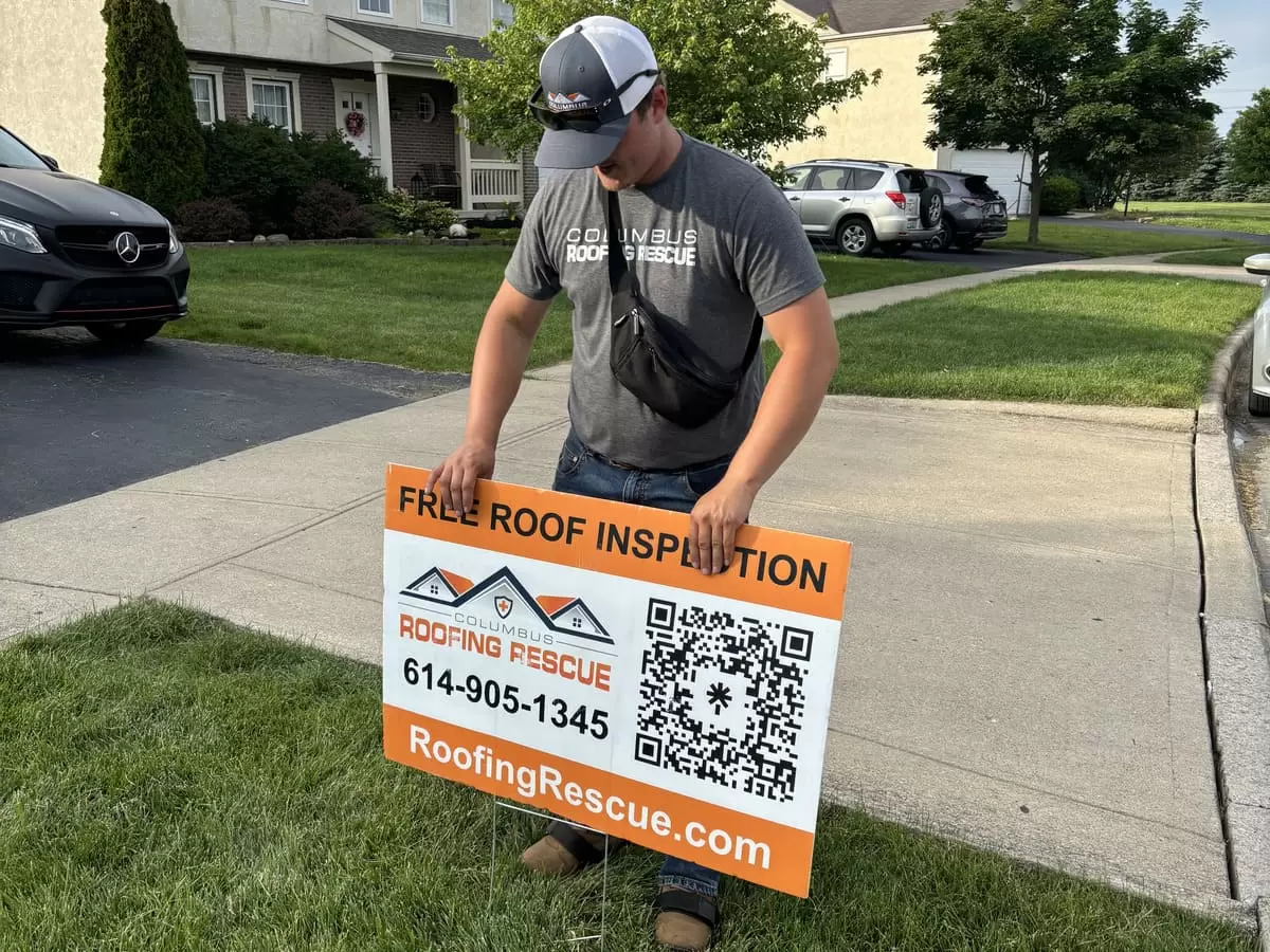 Placing a yard sign in the customers yard